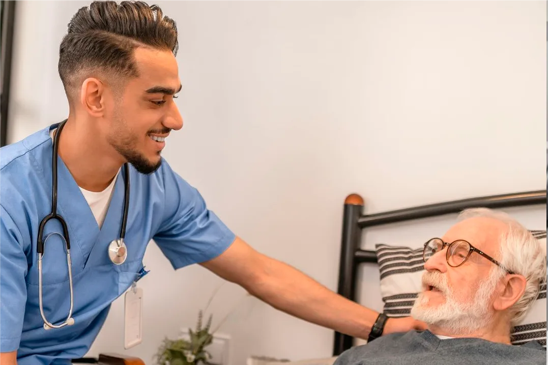 Nurse helping patient with post-hospital recovery at home in Houston